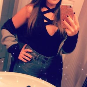 Black crisscross body suit